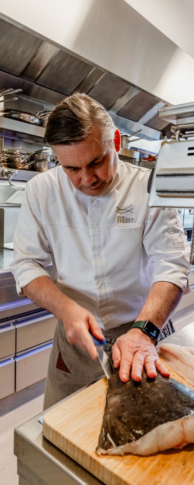 De chef-kok van Den Gouden Karpel